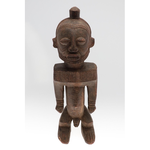 630 - LARGE AFRICAN TRIBAL FIGURE - DEMOCRATIC REPUBLIC OF CONGO. A large carved standing wooden figure, w... 