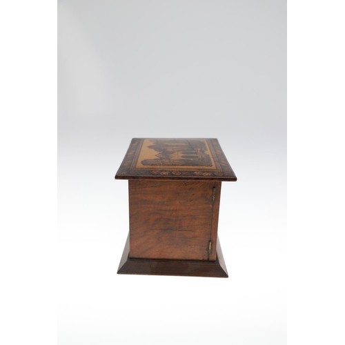 642 - VICTORIAN TUNBRIDGE WARE TABLE CABINET. A walnut and inlaid table cabinet, the lid with a depiction ... 