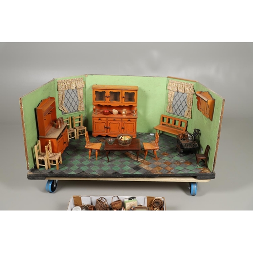 659 - CHILDRENS MODEL KITCHEN WITH DOLLS HOUSE FURNITURE & ACCESSORIES. A children's model kitchen, the op... 