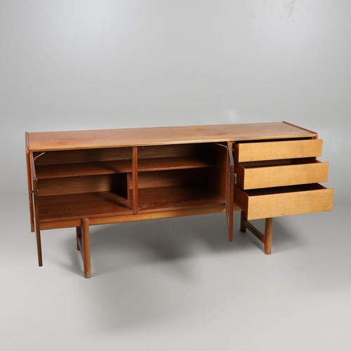 670 - MCINTOSH - TEAK MID CENTURY DINING SUITE. Comprising a sideboard with three drawers and large two do... 