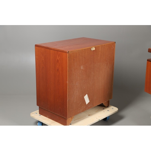 674 - A MID CENTURY G-PLAN TEAK DRESSING TABLE AND MATCHING CHEST OF DRAWERS. The dressing table with two ... 