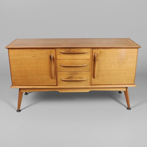 675 - A MID CENTURY TEAK SIDEBOARD & DINING TABLE - HANDCRAFT. With three central drawers flanked by two c... 