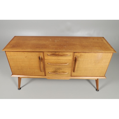 675 - A MID CENTURY TEAK SIDEBOARD & DINING TABLE - HANDCRAFT. With three central drawers flanked by two c... 