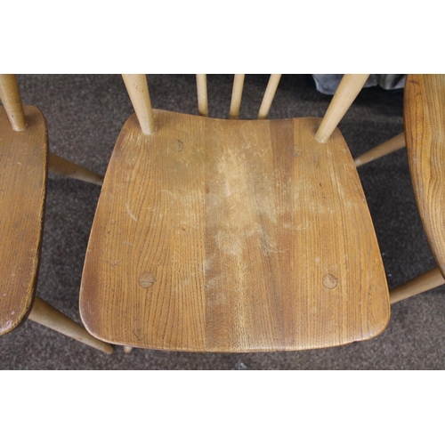 676 - VINTAGE ERCOL SIDE TABLE AND TWO DINING CHAIRS. An elm and beech side table of rectangular shape wit... 