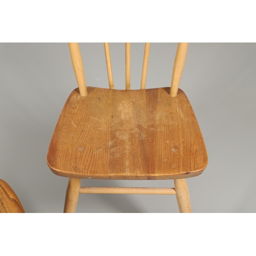 676 - VINTAGE ERCOL SIDE TABLE AND TWO DINING CHAIRS. An elm and beech side table of rectangular shape wit... 