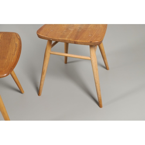 676 - VINTAGE ERCOL SIDE TABLE AND TWO DINING CHAIRS. An elm and beech side table of rectangular shape wit... 