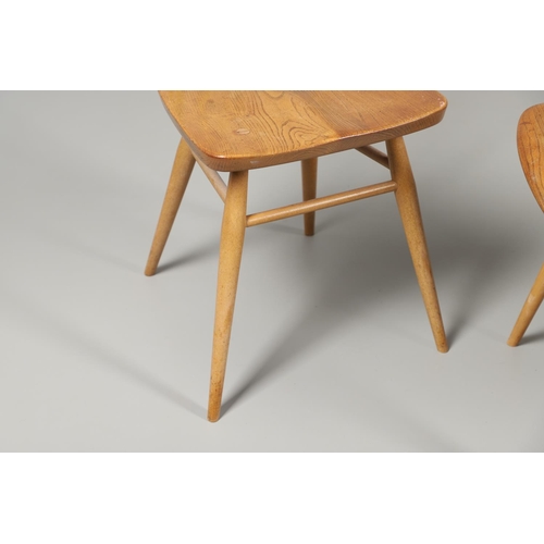 676 - VINTAGE ERCOL SIDE TABLE AND TWO DINING CHAIRS. An elm and beech side table of rectangular shape wit... 