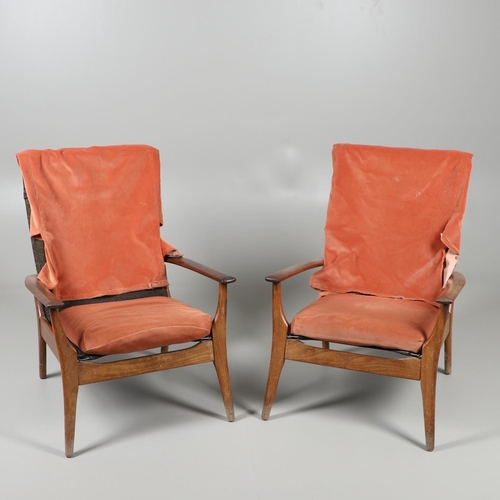 678 - A PAIR OF MID CENTURY ARMCHAIRS - FURPRO. A pair of teak chairs with wide arms and splayed legs, the... 