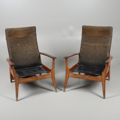 678 - A PAIR OF MID CENTURY ARMCHAIRS - FURPRO. A pair of teak chairs with wide arms and splayed legs, the... 