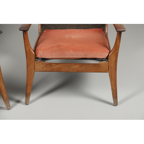 678 - A PAIR OF MID CENTURY ARMCHAIRS - FURPRO. A pair of teak chairs with wide arms and splayed legs, the... 