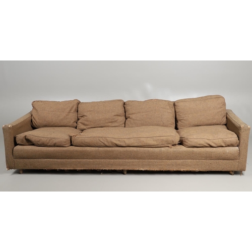 680 - A LARGE 1960'S HEALS SOFA. A large four seater sofa with loose cushions and supported on six legs. D... 