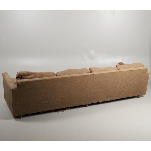 680 - A LARGE 1960'S HEALS SOFA. A large four seater sofa with loose cushions and supported on six legs. D... 