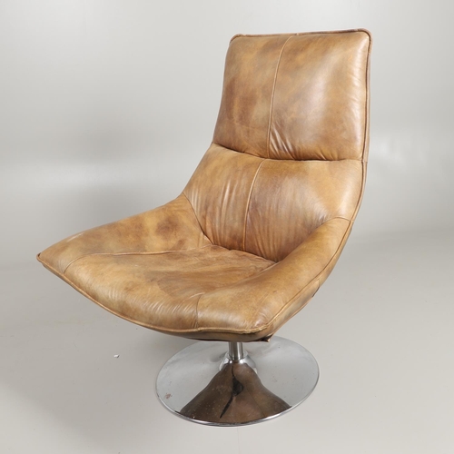 681 - ANDREW MARTIN - DESIGNER LEATHER SWIVEL CHAIR 'CARLOTTA'. A leather swivel chair of large proportion... 