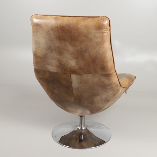 681 - ANDREW MARTIN - DESIGNER LEATHER SWIVEL CHAIR 'CARLOTTA'. A leather swivel chair of large proportion... 