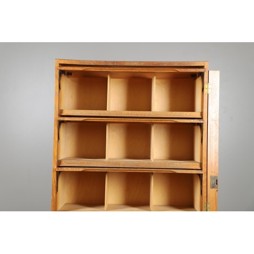 683 - A 'STAVERTON' LIGHT OAK BOOKCASE. In the Globe Wernicke style with pigeon hole compartments, stamped... 