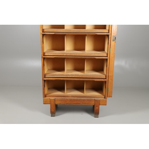 683 - A 'STAVERTON' LIGHT OAK BOOKCASE. In the Globe Wernicke style with pigeon hole compartments, stamped... 