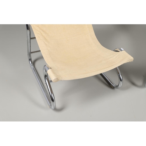 686 - A PAIR OF MODERN CHROME & CANVAS CHAIRS. A pair of chairs with a tubular chrome frame and canvas sea... 