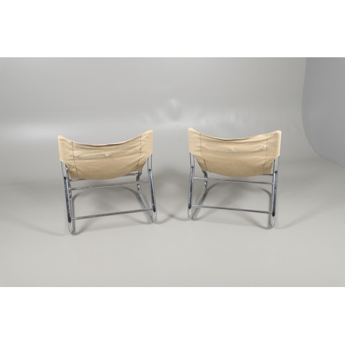 686 - A PAIR OF MODERN CHROME & CANVAS CHAIRS. A pair of chairs with a tubular chrome frame and canvas sea... 