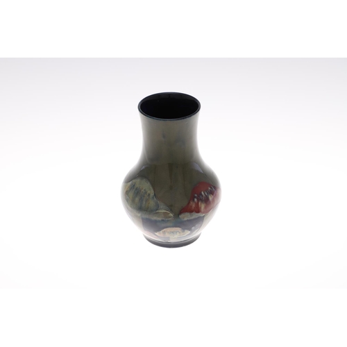 691 - ANTIQUE MOORCROFT VASE - CLAREMONT. The vase of bulbous form, painted in the Claremont design on a g... 