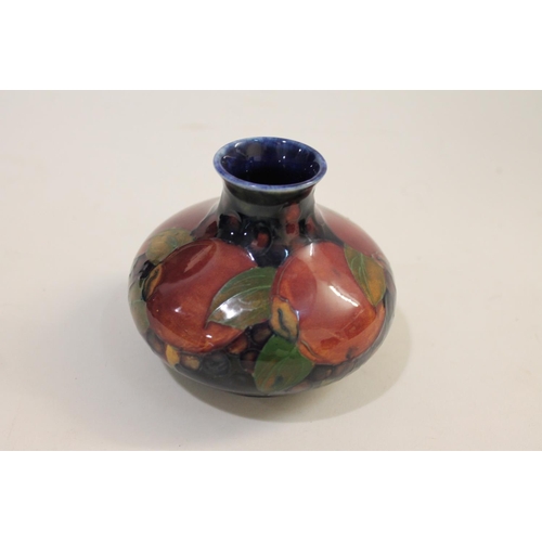 692 - ANTIQUE MOORCROFT BOWL ON THREE FEET, & SMALL MOORCROFT VASE - POMEGRANATE. A Moorcroft bowl support... 