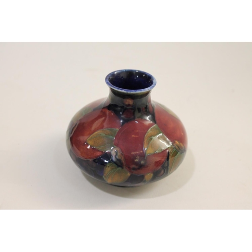 692 - ANTIQUE MOORCROFT BOWL ON THREE FEET, & SMALL MOORCROFT VASE - POMEGRANATE. A Moorcroft bowl support... 