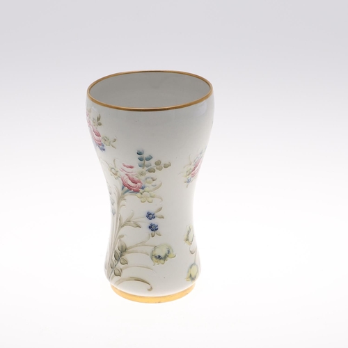 693 - MACINTYRE MOORCROFT VASE. The vase painted with sprays of Roses, Tulips and Forget-me-nots, and with... 