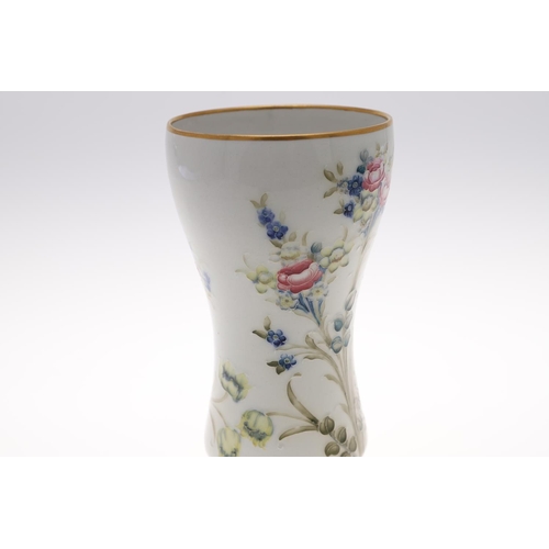 693 - MACINTYRE MOORCROFT VASE. The vase painted with sprays of Roses, Tulips and Forget-me-nots, and with... 