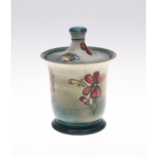 699 - MOORCROFT LIDDED JAR - SPRING FLOWERS, & A LIDDED GINGER JAR. A lidded Moorcroft jar in the Spring F... 