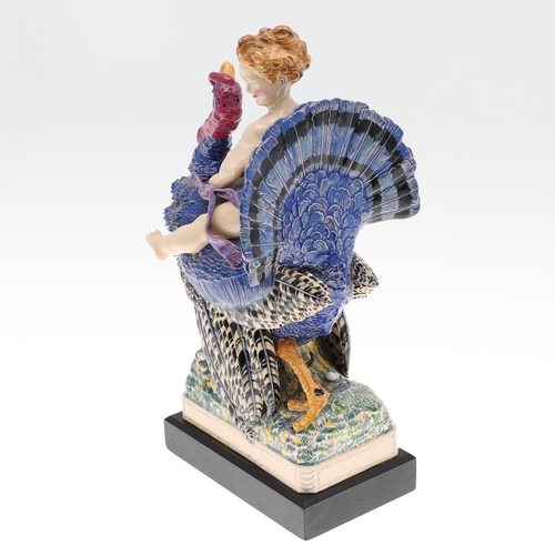 701 - HARRY PARR - CHELSEA POTTERY FIGURE, 1934. A pottery figure of a boy riding a Turkey, brightly paint... 