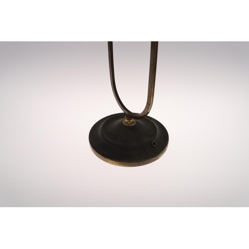 705 - A BRASS 'MUSHROOM' FORM DESK LAMP. The lamp with a U-shape stem and circular base, and with a dome s... 