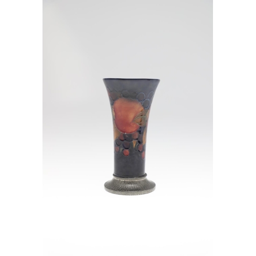 723 - MOORCROFT TUDRIC VASE, & MOORCROFT DISH. A slender vase in the Pomegranate design and mounted with a... 