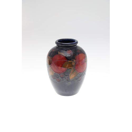 731 - ANTIQUE LARGE MOORCROFT VASE, LARGE LIDDED BOX & VASE. A large lidded circular box, painted in the P... 