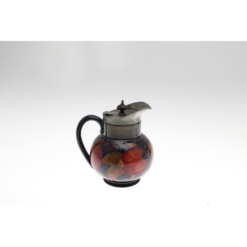 733 - ANTIQUE MOORCROFT TEAPOT, COFFEE POT & OTHER ITEMS - POMEGRANATE. Including a globular teapot with a... 