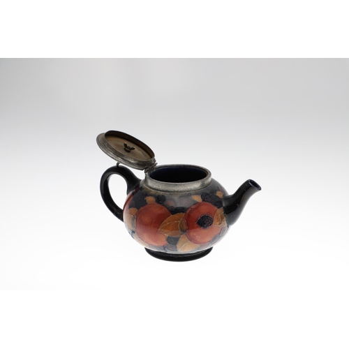 733 - ANTIQUE MOORCROFT TEAPOT, COFFEE POT & OTHER ITEMS - POMEGRANATE. Including a globular teapot with a... 