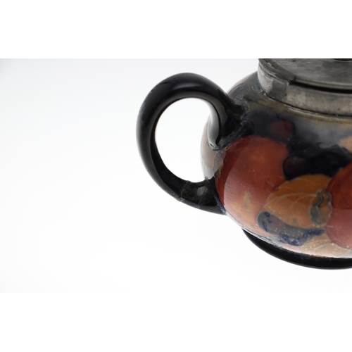 733 - ANTIQUE MOORCROFT TEAPOT, COFFEE POT & OTHER ITEMS - POMEGRANATE. Including a globular teapot with a... 