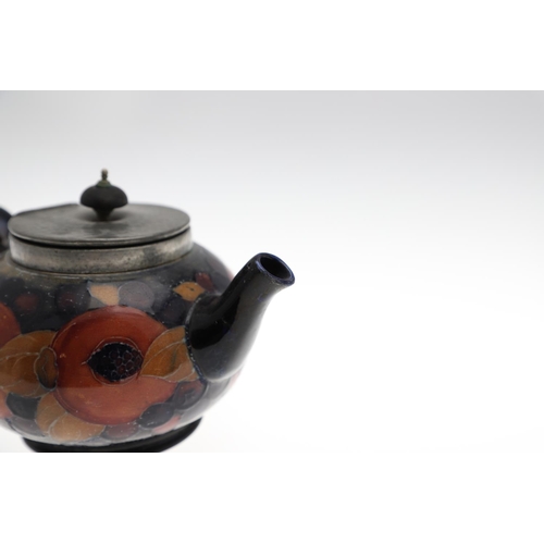 733 - ANTIQUE MOORCROFT TEAPOT, COFFEE POT & OTHER ITEMS - POMEGRANATE. Including a globular teapot with a... 