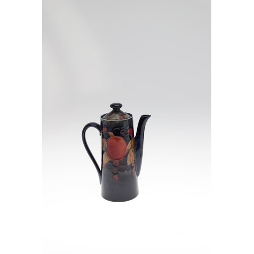 733 - ANTIQUE MOORCROFT TEAPOT, COFFEE POT & OTHER ITEMS - POMEGRANATE. Including a globular teapot with a... 