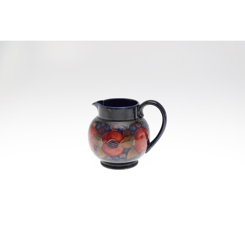 734 - ANTIQUE MOORCROFT JUG & OTHER ITEMS - POMEGRANATE. Including a squat jug painted in the Pomegranate ... 