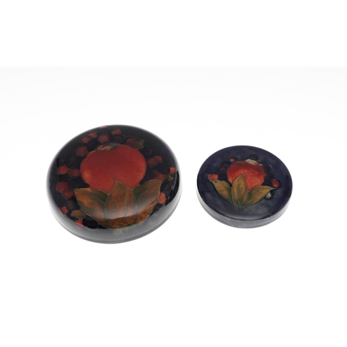 735 - ANTIQUE MOORCROFT ITEMS - POMEGRANATE. A mixed lot including a small slender vase (8.5cms high), a c... 