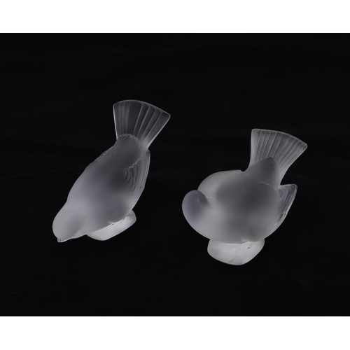 742 - TWO LALIQUE GLASS BIRDS. Two modern frosted glass birds by Lalique, 9.5cms and 8cms high. Both signe... 