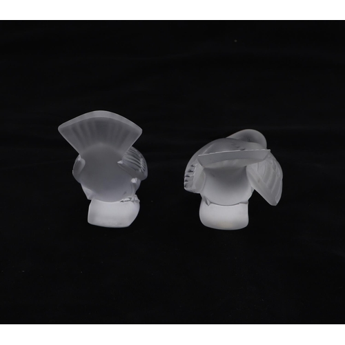 742 - TWO LALIQUE GLASS BIRDS. Two modern frosted glass birds by Lalique, 9.5cms and 8cms high. Both signe... 