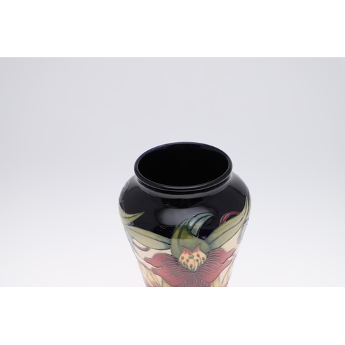 745 - LARGE MOORCROFT TRIAL VASE - ANNA LILY. A modern Moorcroft vase in the Anna Lily vase, in a trial sh... 