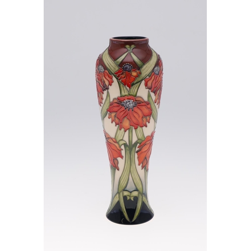 746 - MOORCROFT TRIAL VASE - RUDBEKIA. A large slender trial vase painted in the Rudbekia design, brightly... 