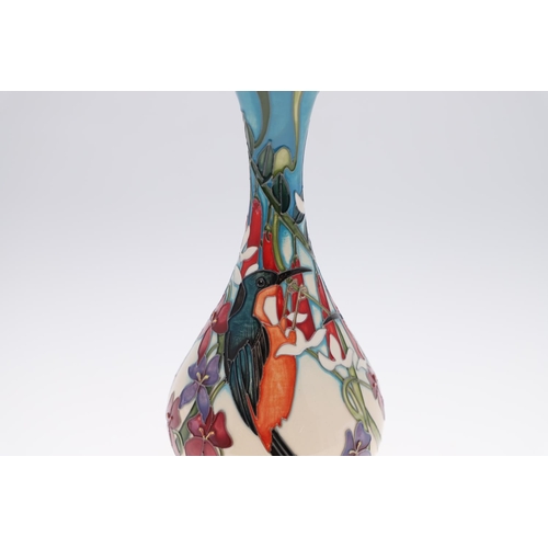 751 - MOORCROFT TRIAL VASE - ROBIN. A bottle shaped vase painted with Robins amongst foliage. Marked, Moor... 