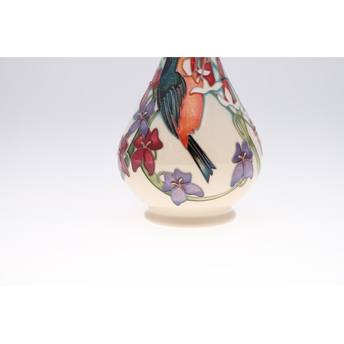 751 - MOORCROFT TRIAL VASE - ROBIN. A bottle shaped vase painted with Robins amongst foliage. Marked, Moor... 