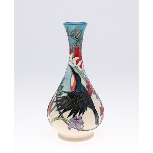 751 - MOORCROFT TRIAL VASE - ROBIN. A bottle shaped vase painted with Robins amongst foliage. Marked, Moor... 