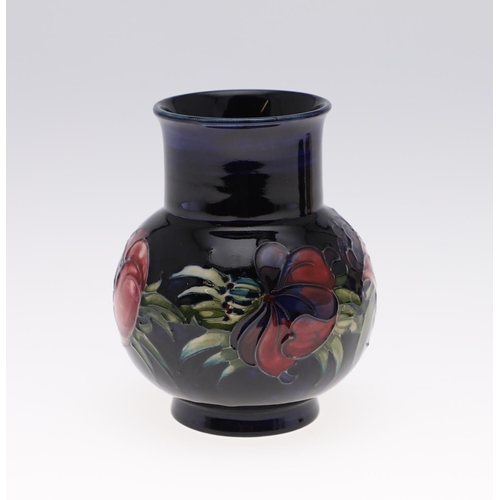 752 - MOORCROFT VASES & JUG. Including a 1930's blue jug (12cms high), a modern Anemone vase painted with ... 