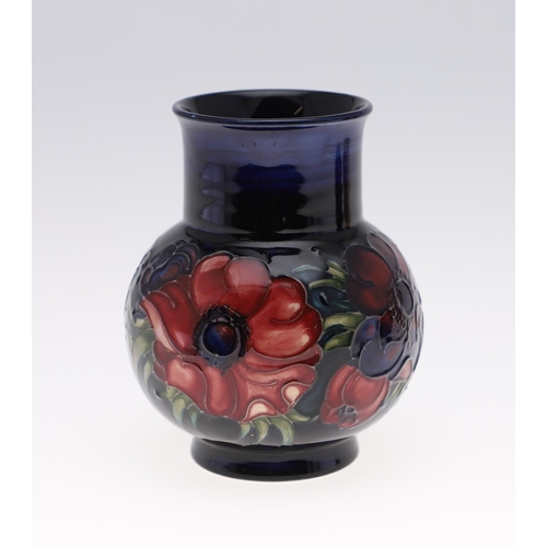 752 - MOORCROFT VASES & JUG. Including a 1930's blue jug (12cms high), a modern Anemone vase painted with ... 