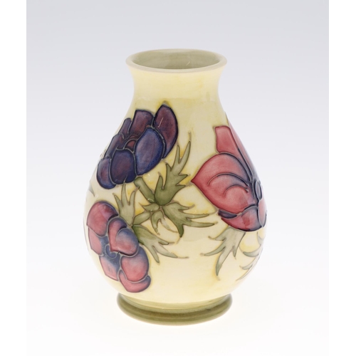 752 - MOORCROFT VASES & JUG. Including a 1930's blue jug (12cms high), a modern Anemone vase painted with ... 