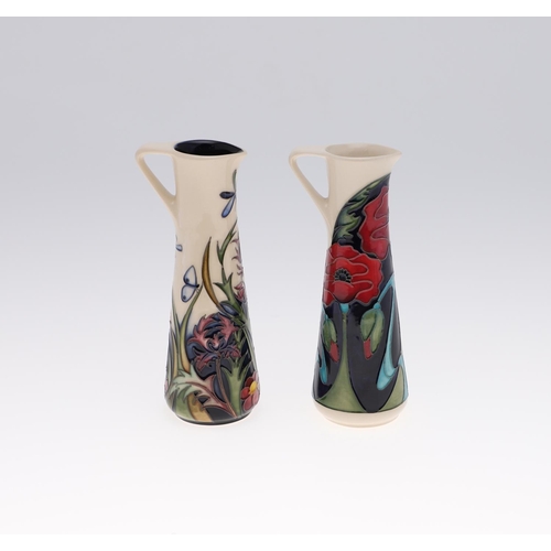 753 - MODERN MOORCROFT JUGS - WALNUT TREE MEADOW & POPPY. Including a slender vase in the Walnut Tree Mead... 